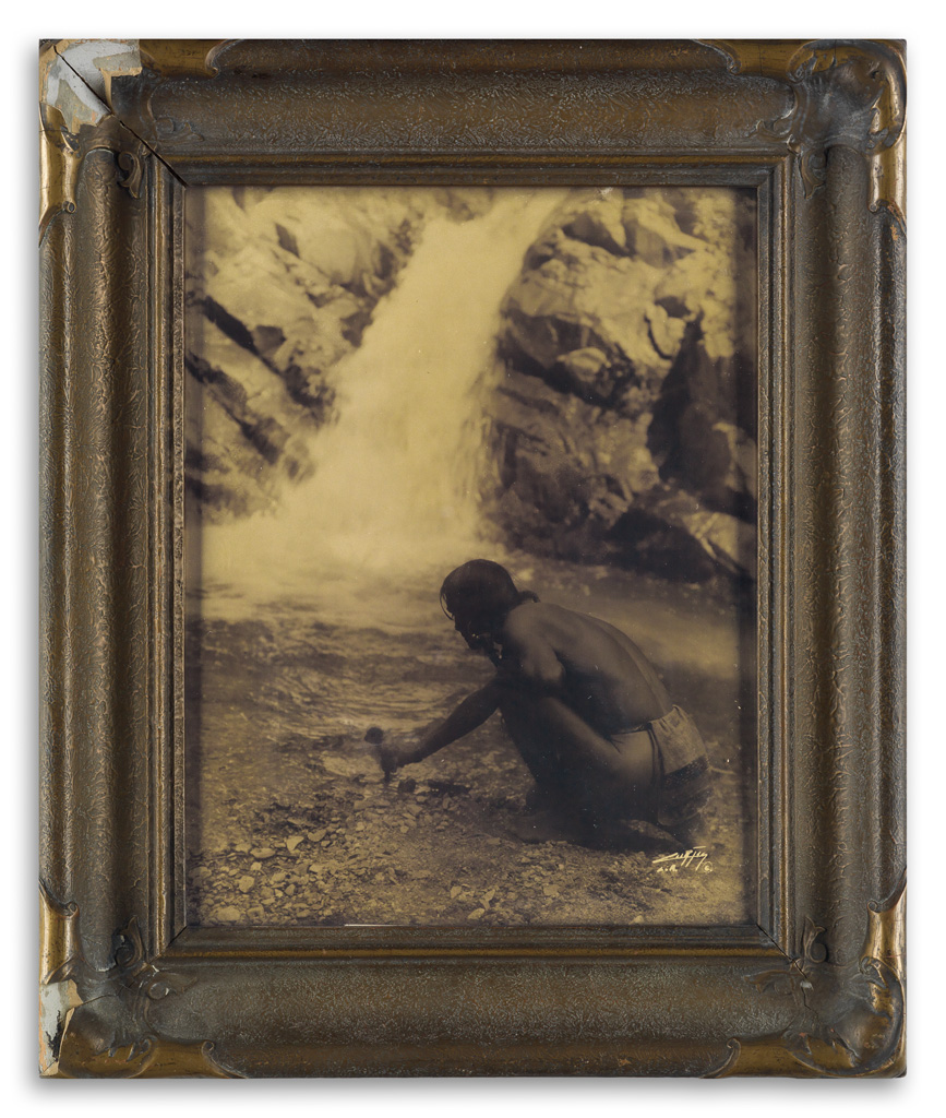 EDWARD S. CURTIS (1868-1952) An Offering at the Waterfall, Nambe.